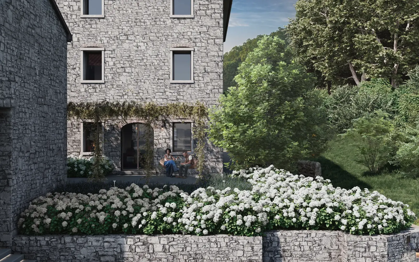 Bistrot-Fassade mit blühendem Garten in Borgo Taurino